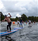 A Group Racing on Paddleboards