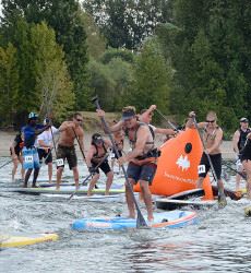 Group of Men and Women on Paddleboards